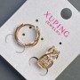 Orecchini Xuping 9×15 mm con doratura 18K e strass bianchi
