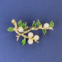Spilla «Rametti» con perle in metallo dorato 48×32 mm