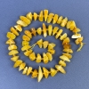 Perline di ambra granuli 9-12×3-5 mm ± con perline da 2,5 mm ± su filo, lunghezza 39 cm