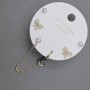 Orecchini a perno con cabochon, metallo dorato e strass bianchi