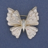 Spilla-ciondolo Farfalla con smalto bianco, strass multicolori, metallo dorato 39x42 mm+