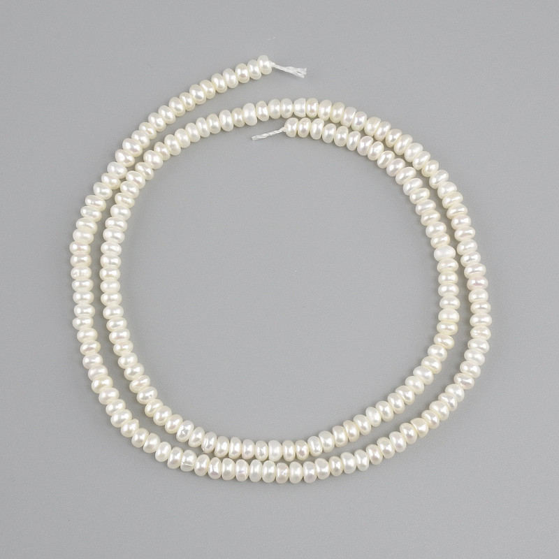Perle d'acqua dolce, diametro 3–3,5×2 mm, lunghezza circa 36 cm, su filo