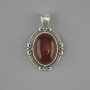 Pendente in corniola 34×21 mm ± metallo argentato