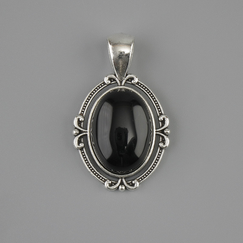 Pendente in agata nera 34×21 mm ± metallo argentato