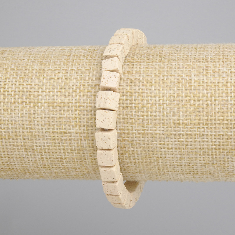 Bracciale lava vulcanica beige — cubi 6x6 mm, lunghezza circa 18 cm, elastico