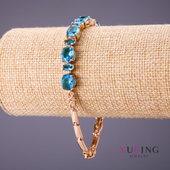 Bracciale Xuping con pietre azzurre, lunghezza 18-20 cm, spessore 4-7 mm, colore oro