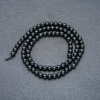 Perline su filo in shungite naturale, sfere lisce, diametro 4–5 mm, lunghezza circa 39 cm