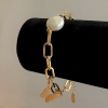 Braccialetto Xuping con doratura in oro 18K e perle barocche, lunghezza 20-22 cm, spessore 7 mm +