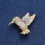 Spilla Colibrì in metallo dorato e strass 25×33 mm +