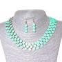 Set di collana e orecchini Bacche, metallo dorato e lucentezza acquamarina